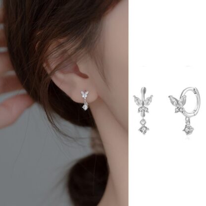 silver hoops, butterfly earrings