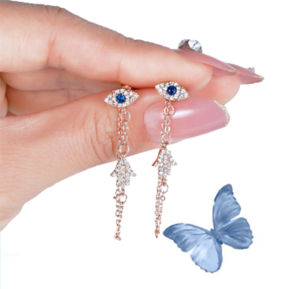 rose gold eye & hand earrings
